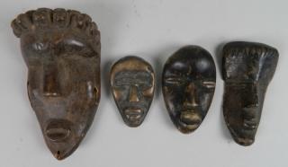 Appraisal: African passport masks African passport masks carved wood '' largest