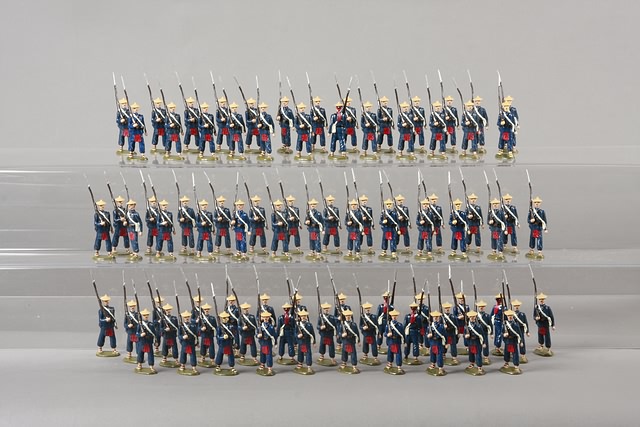 Appraisal: Lot of metal figures representing Chinese Imperial Infantry marching gloss