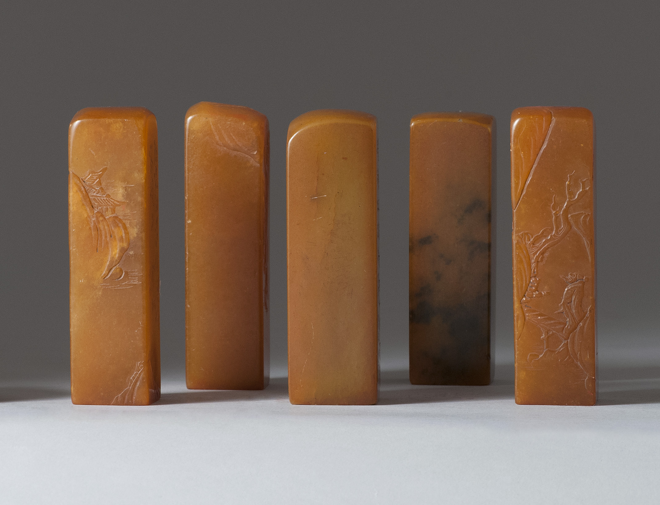 Appraisal: SET OF FIVE YELLOW SOAPSTONE SEALS Early th CenturyIn rectangular