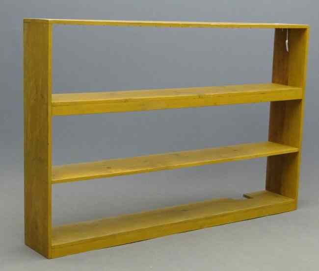 Appraisal: C pine shelf in mustard paint '' W '' D