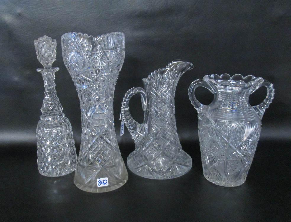 Appraisal: FOUR CUT CRYSTAL VESSELS in various hobstar and geometric patterns