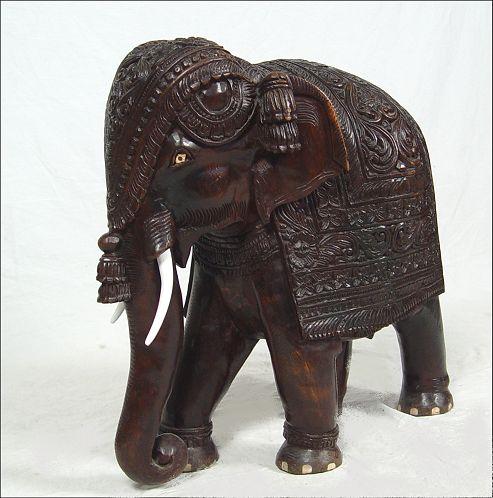 Appraisal: SMALL HEAVILY CARVED ELEPHANT DARK WOOD '' h x ''