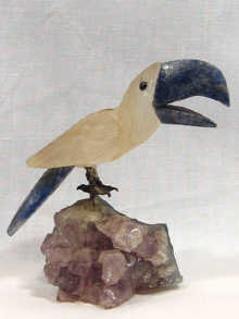 Appraisal: A quartz and lapis lazuli carving of a toucan cm