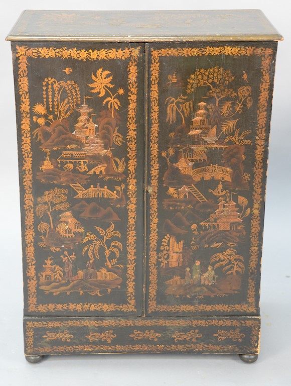 Appraisal: Chinoiserie decorated two door cabinet opening to reveal three drawers