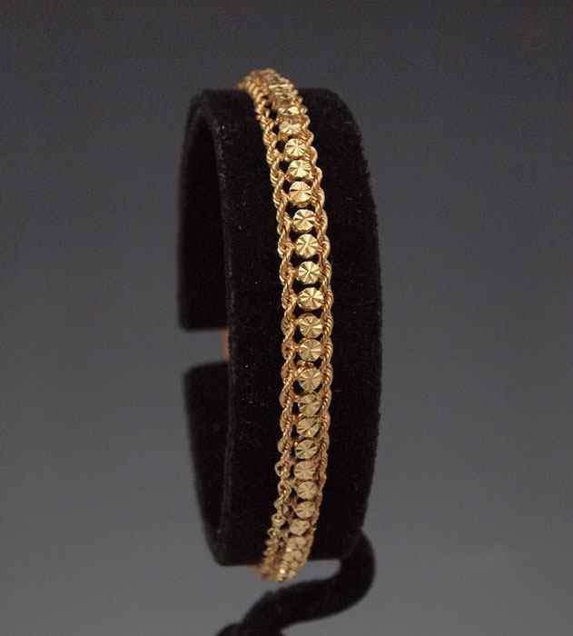 Appraisal: K GOLD BRACELET K yellow gold bracelet Two rope chains