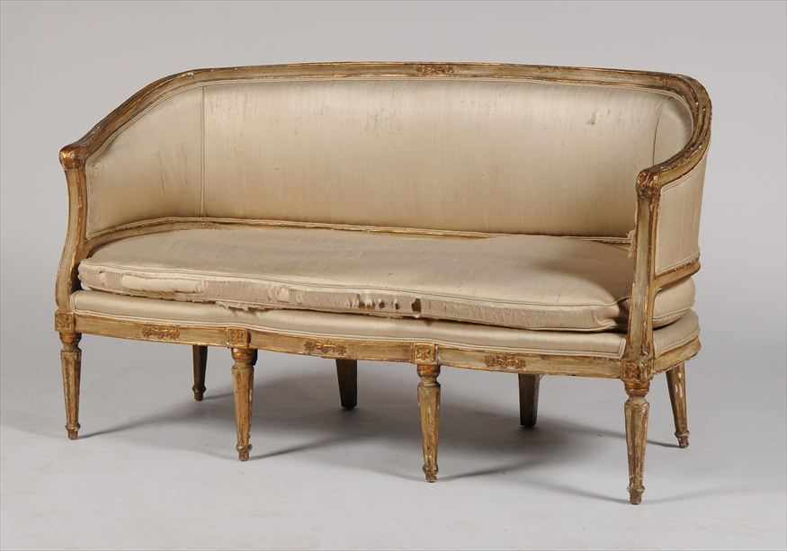 Appraisal: ITALIAN NEOCLASSCAL PAINTED AND PARCEL-GILT SETTEE The downswept upholstered backrest