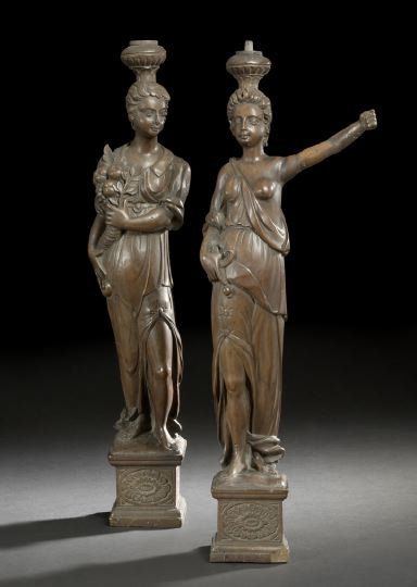 Appraisal: Attractive Pair of German Carved and Stained Lindenwood Female Figures