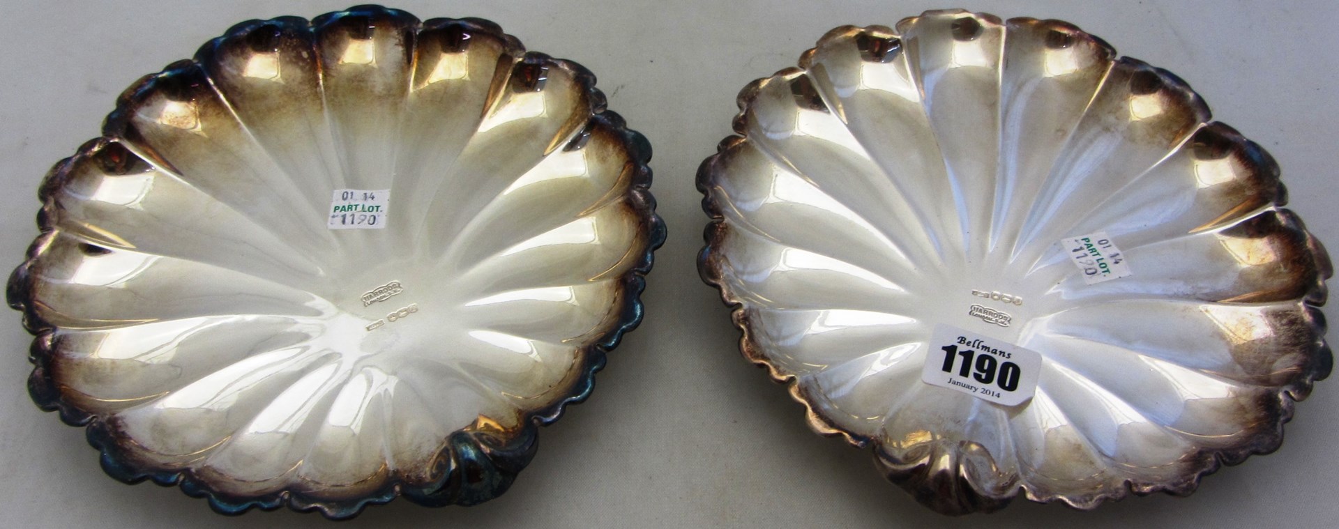 Appraisal: A near pair of silver dishes each of scallop shaped