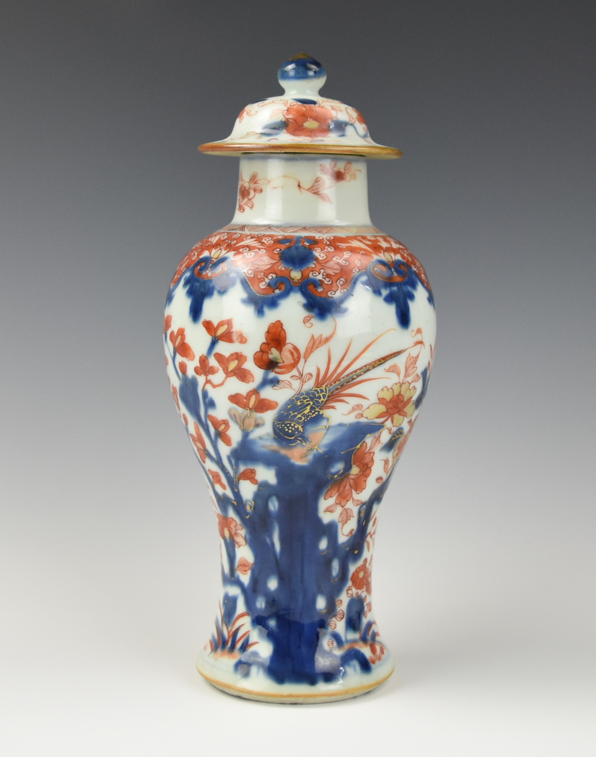 Appraisal: CHINESE BLUE IRON RED VASE AND COVER TH C Chinese