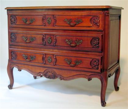 Appraisal: Louis XV style provincial walnut commode The shaped top over