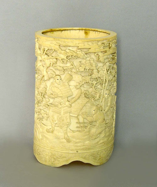 Appraisal: Carved ivory collar with a soldier in a landscape th