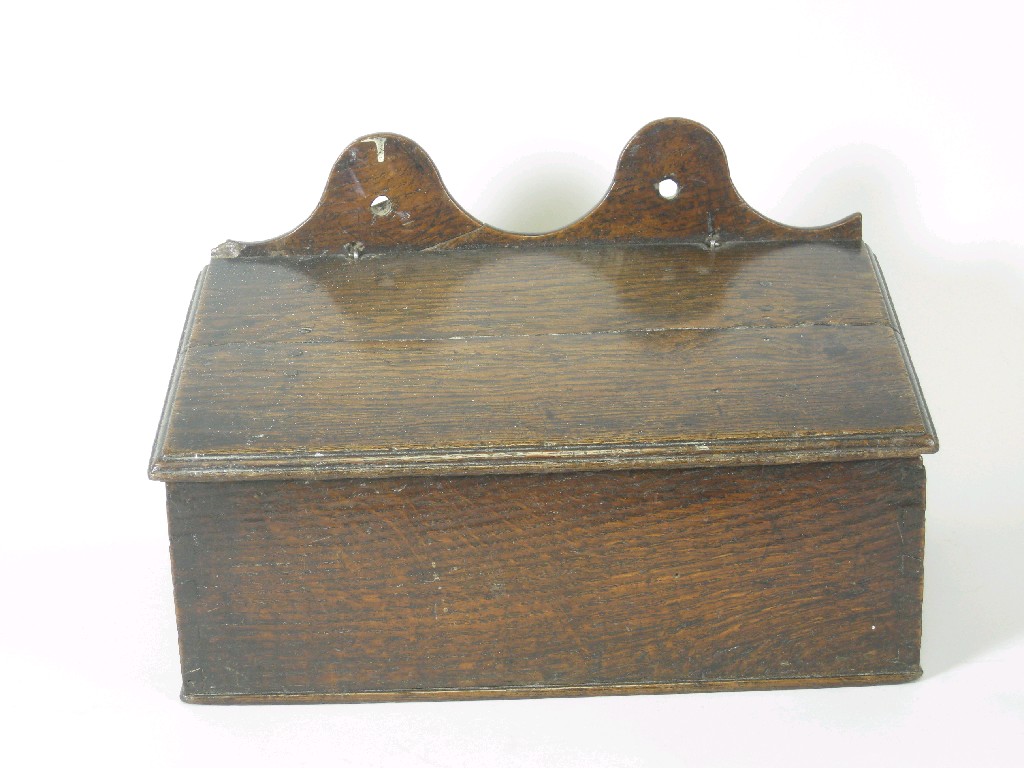 Appraisal: A Georgian oak Candle Box with shaped back and hinged