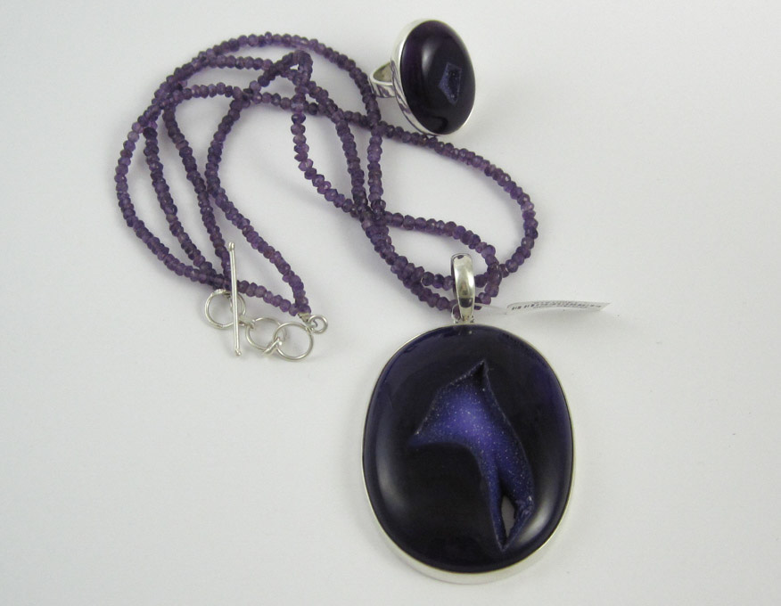 Appraisal: AMETHYST AND STERLING SILVER RING AND NECKLACE both with oval