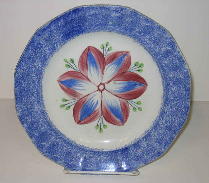 Appraisal: ENGLISH SPATTERWARE Blue spatter plate with central decorated blue and