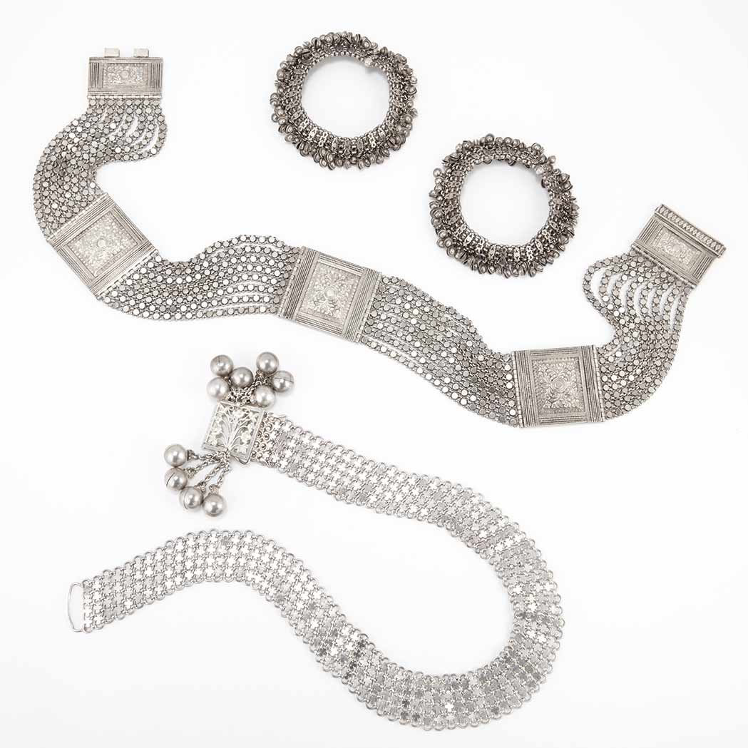 Appraisal: Two Silver and Metal Ethnic Belts and Pair of Ankle