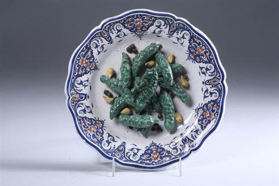 Appraisal: ROUEN FA ENCE CHARGER th century Decorated with applied gherkins