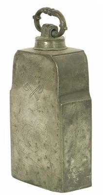 Appraisal: A continental pewter water carrier with wriggle-work decoration and inscribed