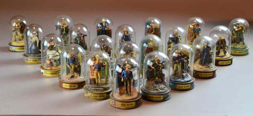 Appraisal: John Wayne Figures in Glass Bell JarsTo include various hand-painted