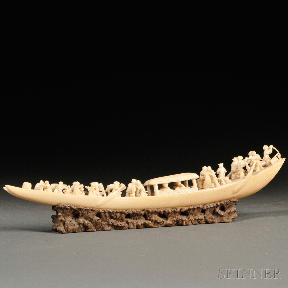 Appraisal: Carved Ivory Boat on Wood Stand China depicting figures rowing