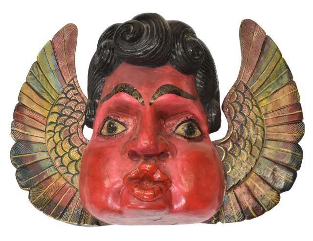 Appraisal: Spanish Colonial style carved wood winged putto mask signed Lucas