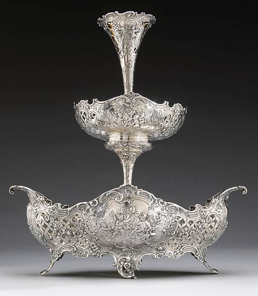 Appraisal: A German sterling three tier centerpiece in the rococo tasteEarly