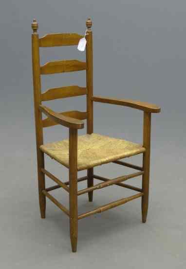 Appraisal: Ladderback rushseat armchair '' Seat H '' Overall Ht