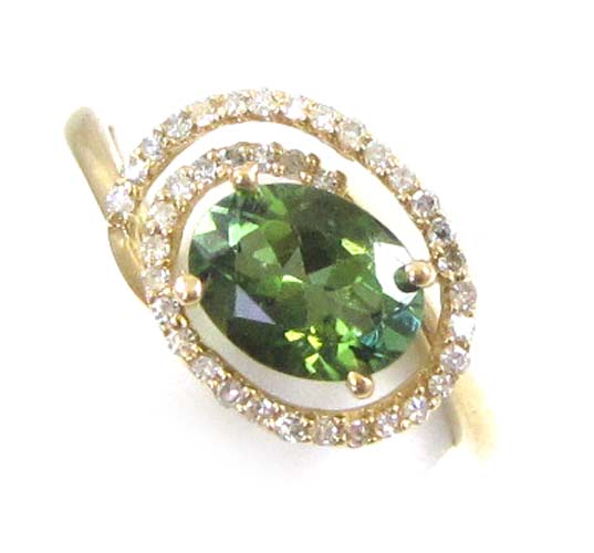 Appraisal: GREEN TOURMALINE AND DIAMOND RING k yellow gold with round-cut