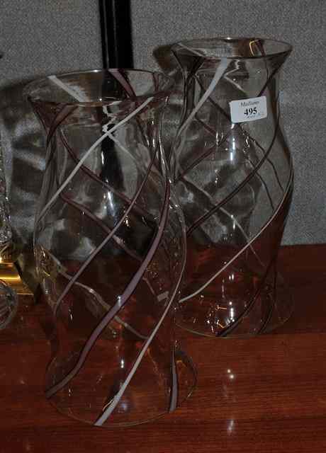 Appraisal: A PAIR OF WAISTED CYLINDRICAL GLASS CANDLE SHADES decorated with