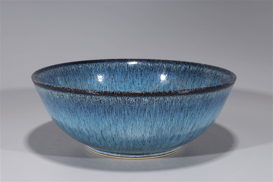 Appraisal: Chinese flambe glazed porcelain bowl possibly meant to be a