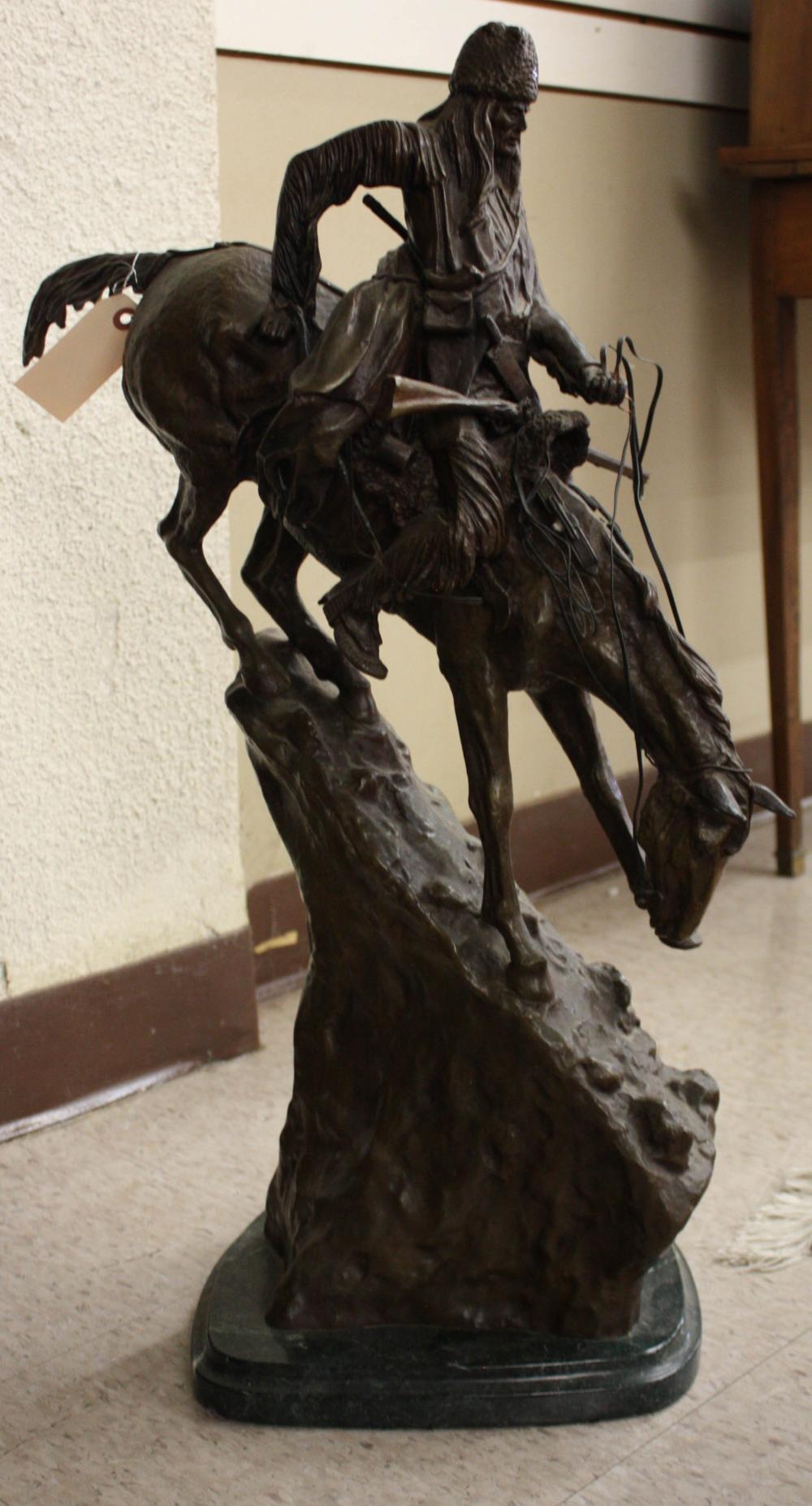 Appraisal: AFTER FREDERIC SACKRIDER REMINGTON American - bronze sculpture The Mountain