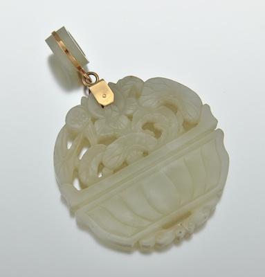 Appraisal: A Carved Jade Disc Pendant Chinese Carved with open flower