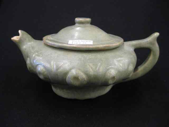 Appraisal: Arts Crafts Pottery Teapot raised carved design '' tall ''