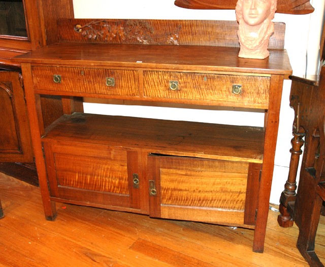 Appraisal: AN AUSTRALIAN BLACKWOOD SIDEBOARD The rectangular back ornately relief carved