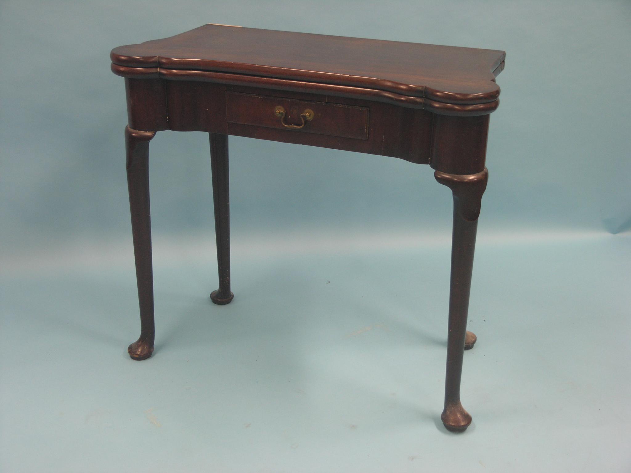 Appraisal: An early George II red walnut card table with single