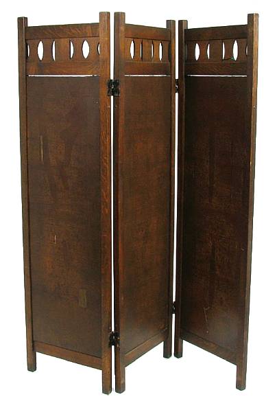 Appraisal: An Arts and Crafts oak and leather three-fold floor screen