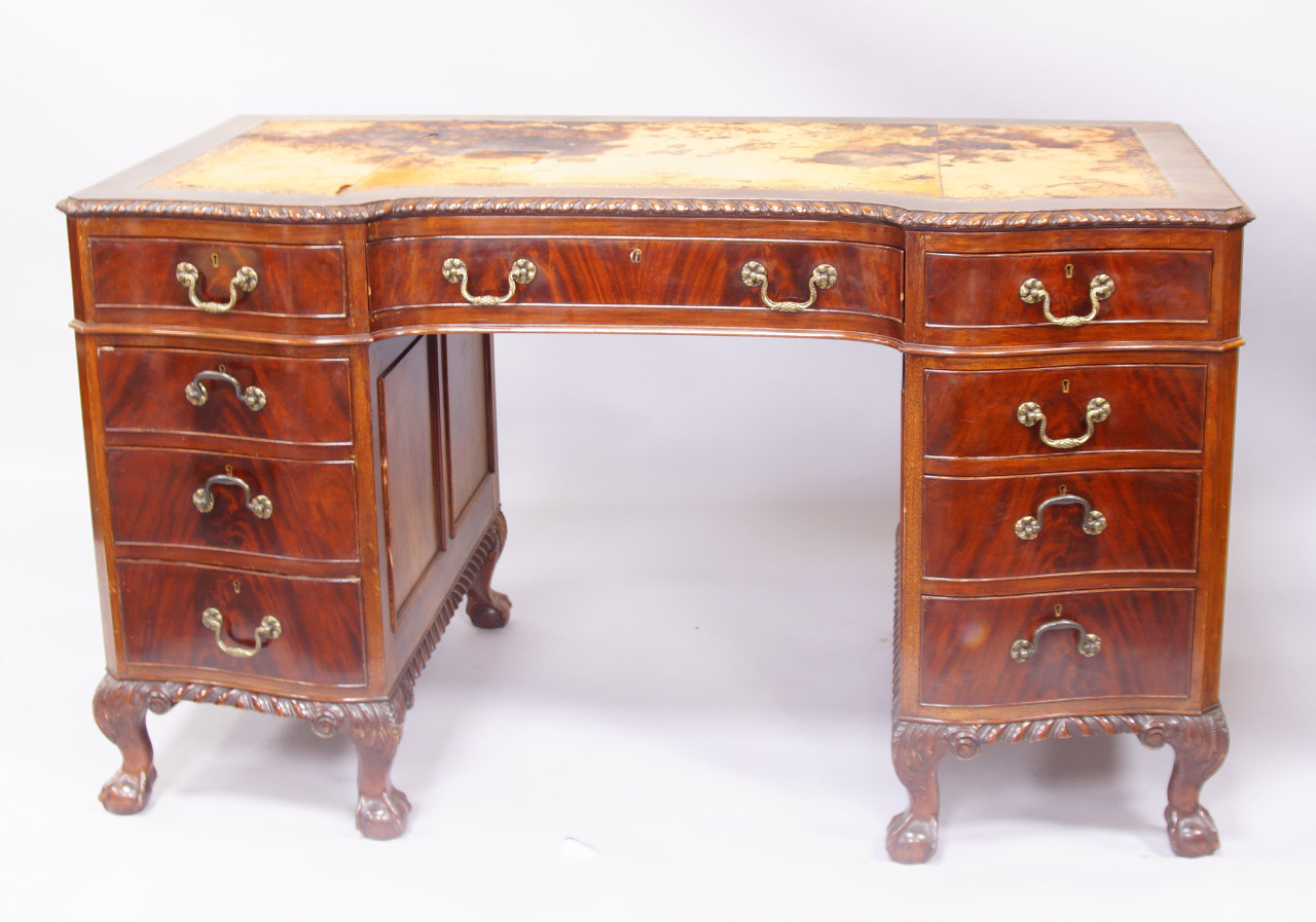 Appraisal: An early thC Chippendale design desk with gadrooned and shaped