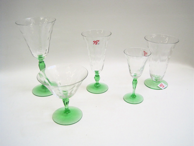 Appraisal: TWENTY-EIGHT PIECE GLASS STEMWARE SET clear bowl with green stems