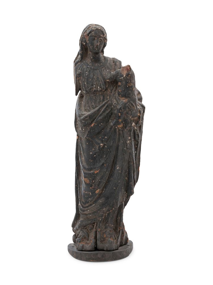 Appraisal: A Continental Carved Wood Figural Group Depicting the Madonna and