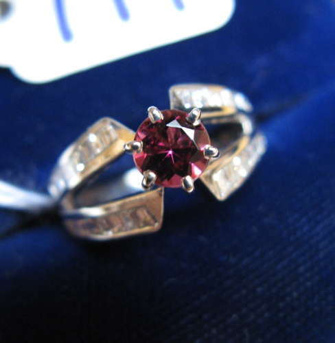 Appraisal: PINK TOURMALINE DIAMOND AND FOURTEEN KARAT WHITE GOLD RING centering