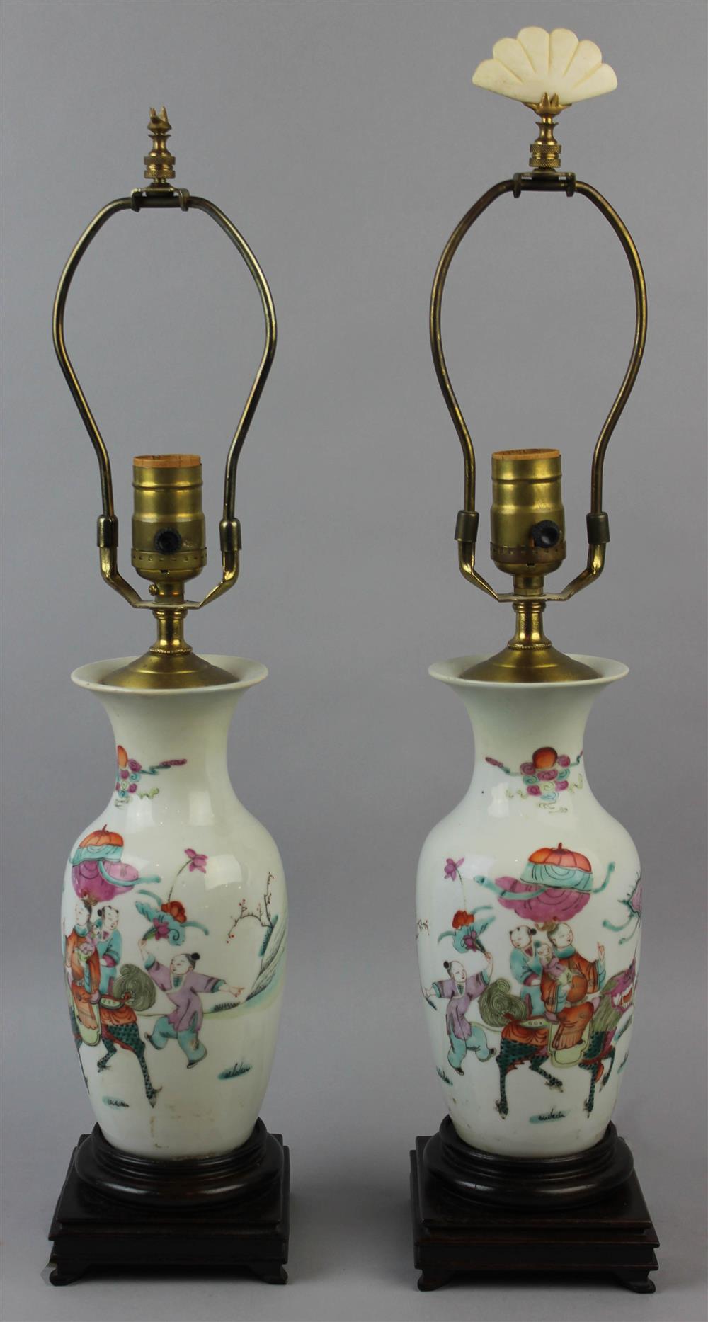 Appraisal: PAIR OF CHINESE FAMILLE ROSE VASES now mounted as table