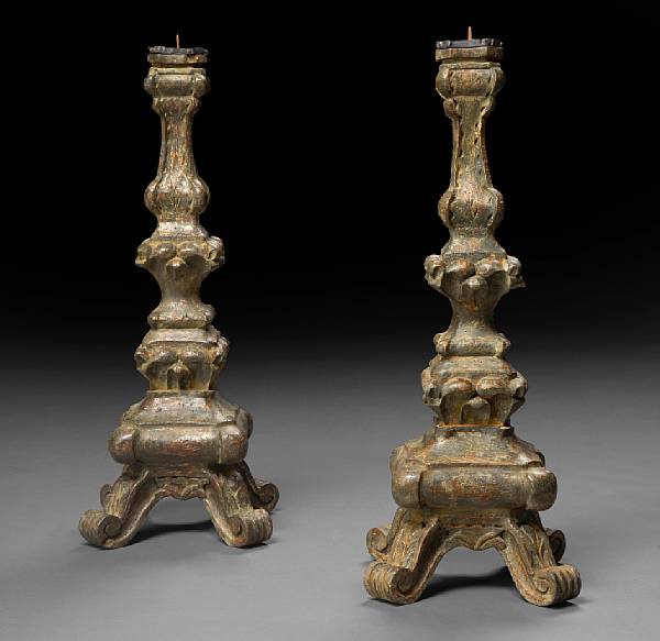 Appraisal: A pair of Italian Baroque style parcel gilt prickets Each