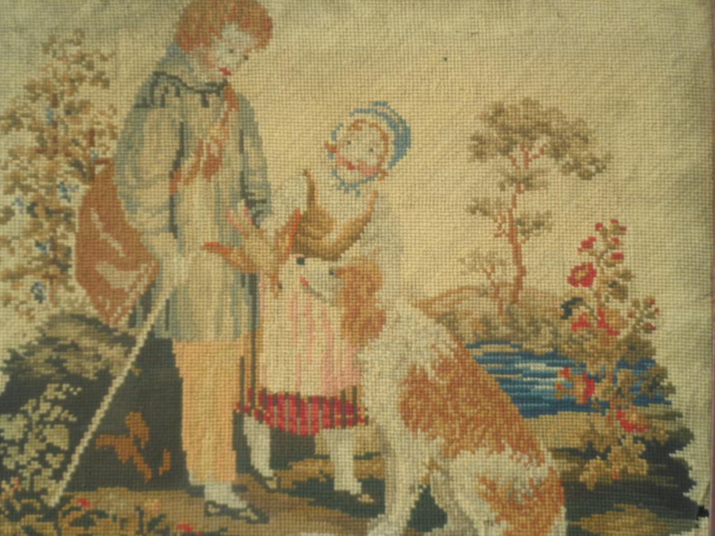 Appraisal: A thC woolwork picture of a gentleman and lady beside