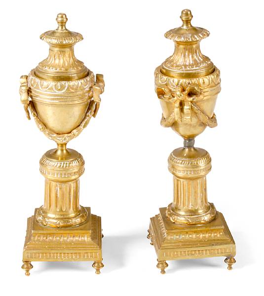 Appraisal: A pair of Louis XVI style reversed bronze cassolettes diameter