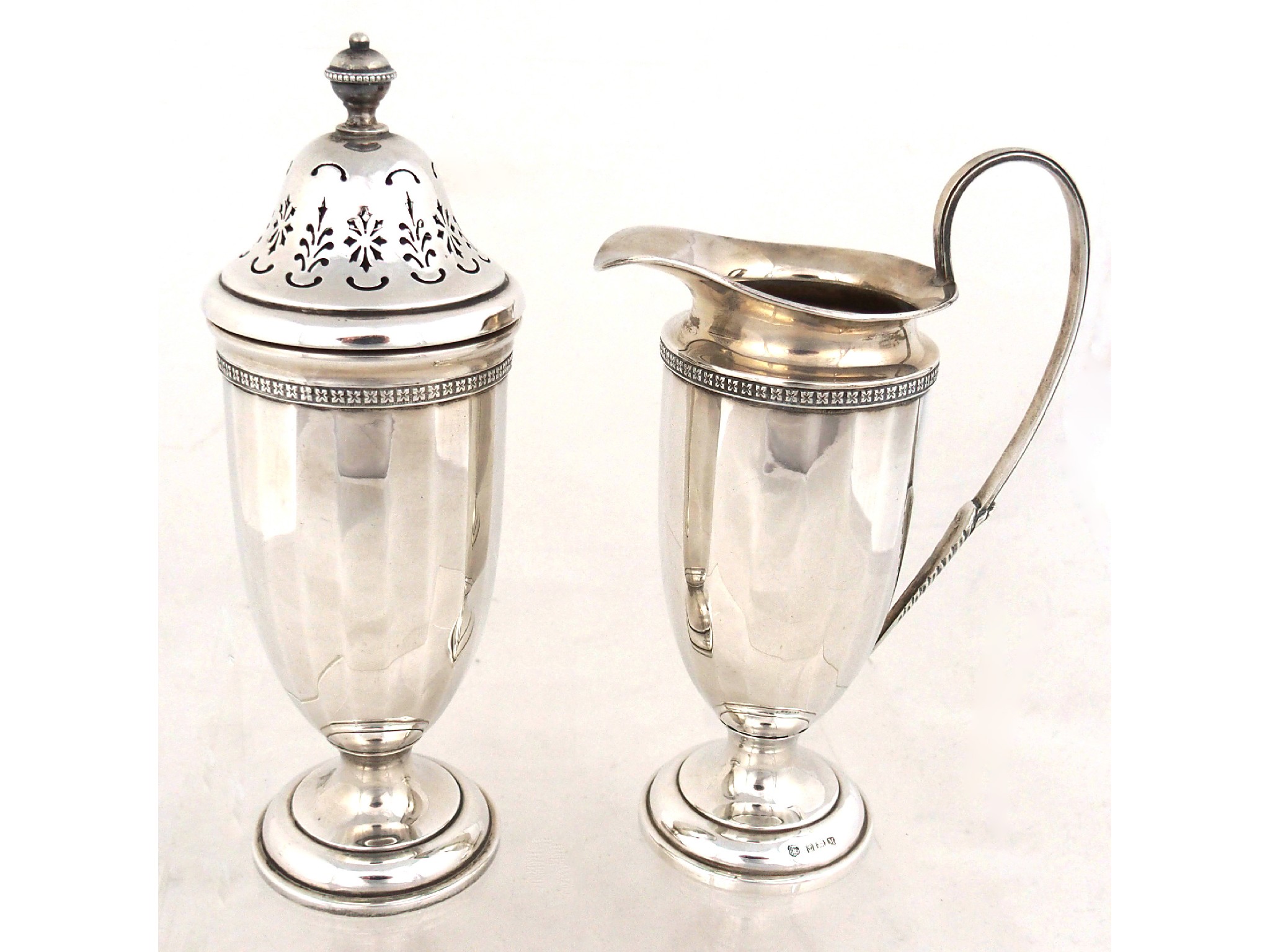 Appraisal: A silver cream jugmaker's mark D B S Limited Birmingham