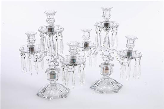 Appraisal: PAIR OF CANDELABRA Clear glass candelabra with three floriform sockets