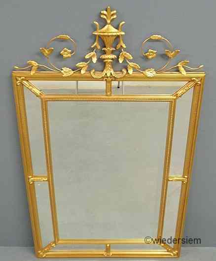 Appraisal: Friedman Bros gilt decorated mirror with beveled glass ''h x