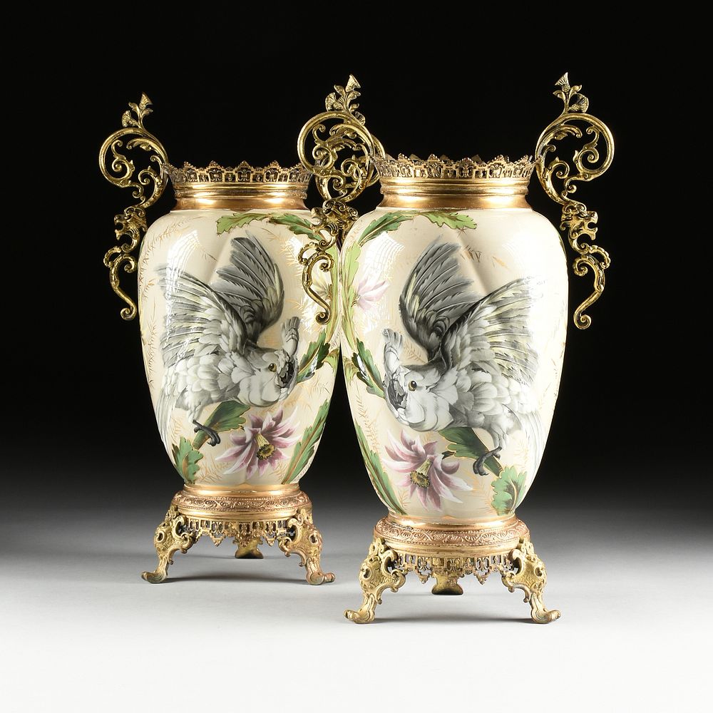 Appraisal: A PAIR OF AESTHETIC MOVEMENT GILT METAL MOUNTED AND COCKATIEL