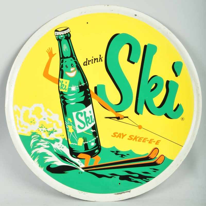 Appraisal: Metal Ski Drink Round Advertising Sign Description Minor border rubs