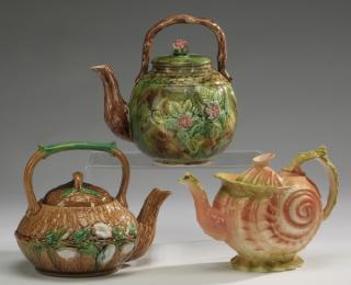 Appraisal: Group of three majolica teapots h Group of three majolica