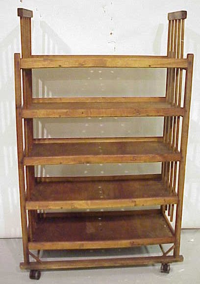 Appraisal: th C wood baker's rack five shelves on casters with